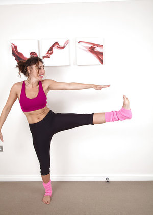 18 year old girl Barbie Bree strips to pink leg warmers in her bedroom